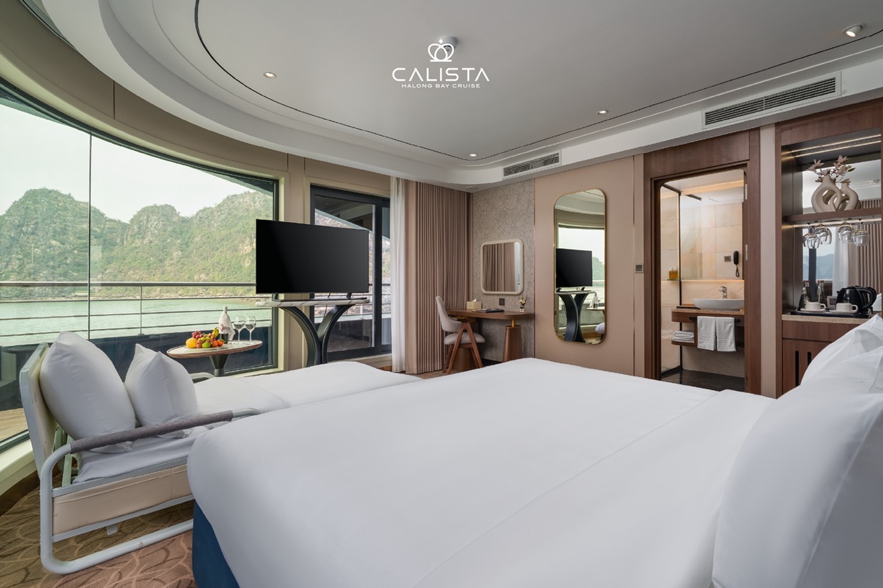 Relaxing cruise balcony view of Halong Bay with lush islands and calm waters, perfect for a romantic.