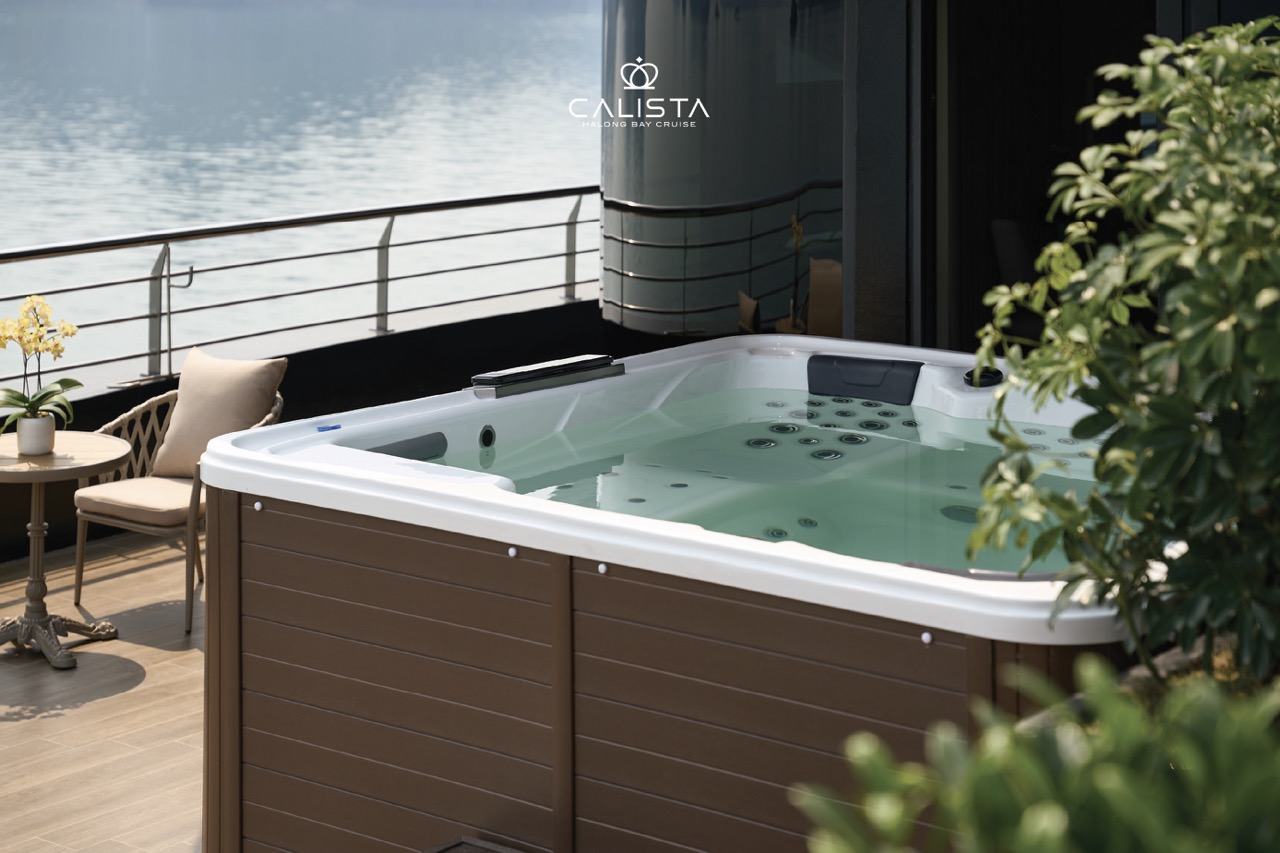 Luxurious hot tub with scenic views of Halong Bay for a relaxing experience.