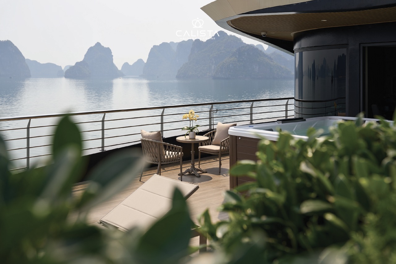 Stunning Halong Bay cruise balcony with panoramic views, perfect for relaxing and enjoying the majes.