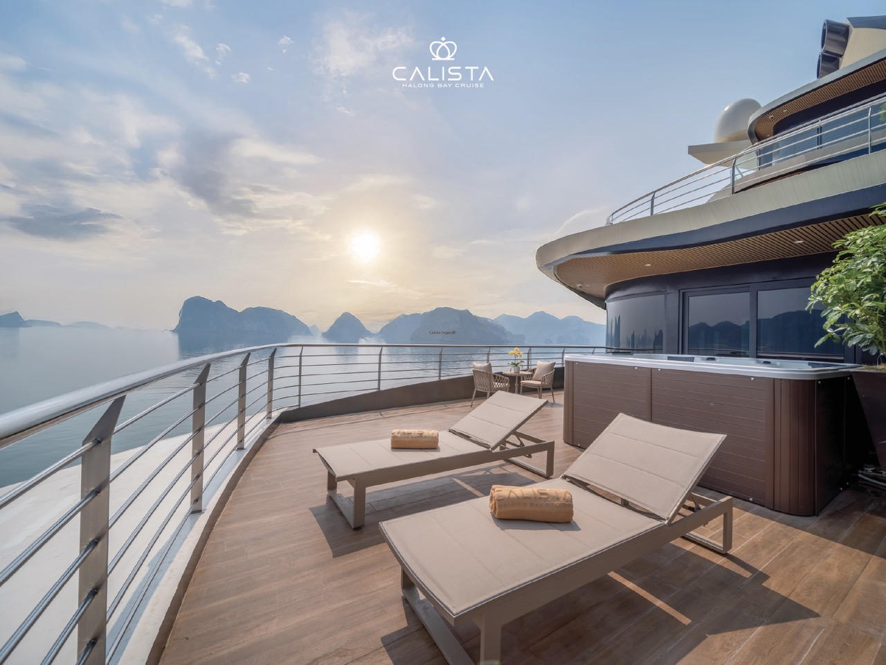 Stunning view from Calista Cruise balcony over Halong Bay, perfect for relaxing and enjoying the sce.