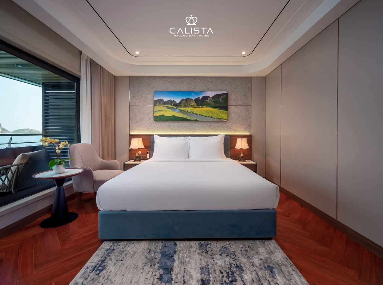 Luxurious cruise cabin with modern decor overlooking Halong Bay, perfect for a memorable 2D1N voyage.