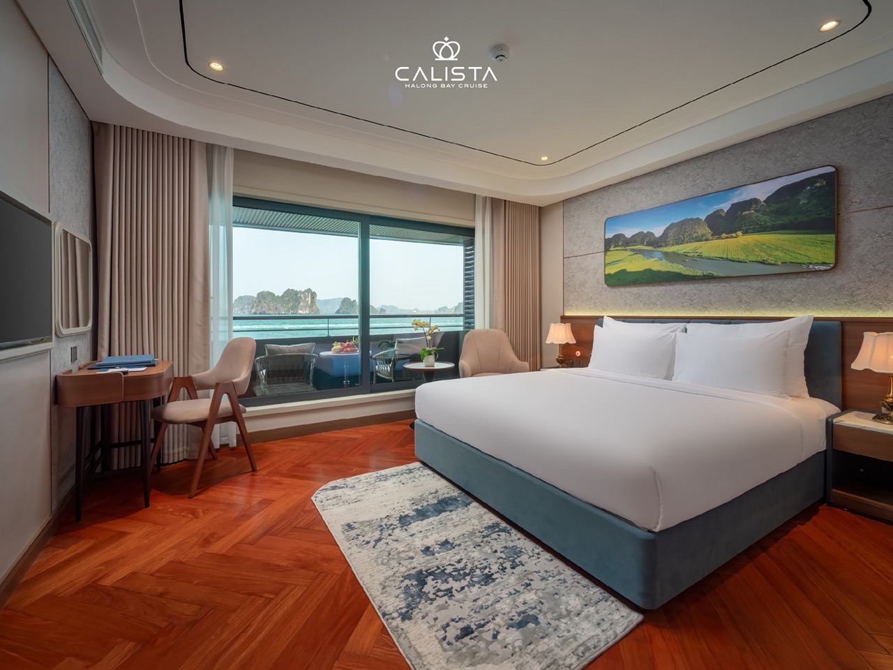 Luxurious cruise balcony view of Halong Bay with stunning seascape and limestone islands.