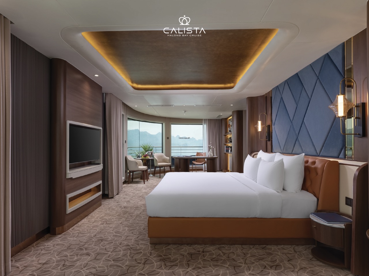 A spacious, elegant cruise cabin with modern decor and panoramic bay views, perfect for a luxurious.