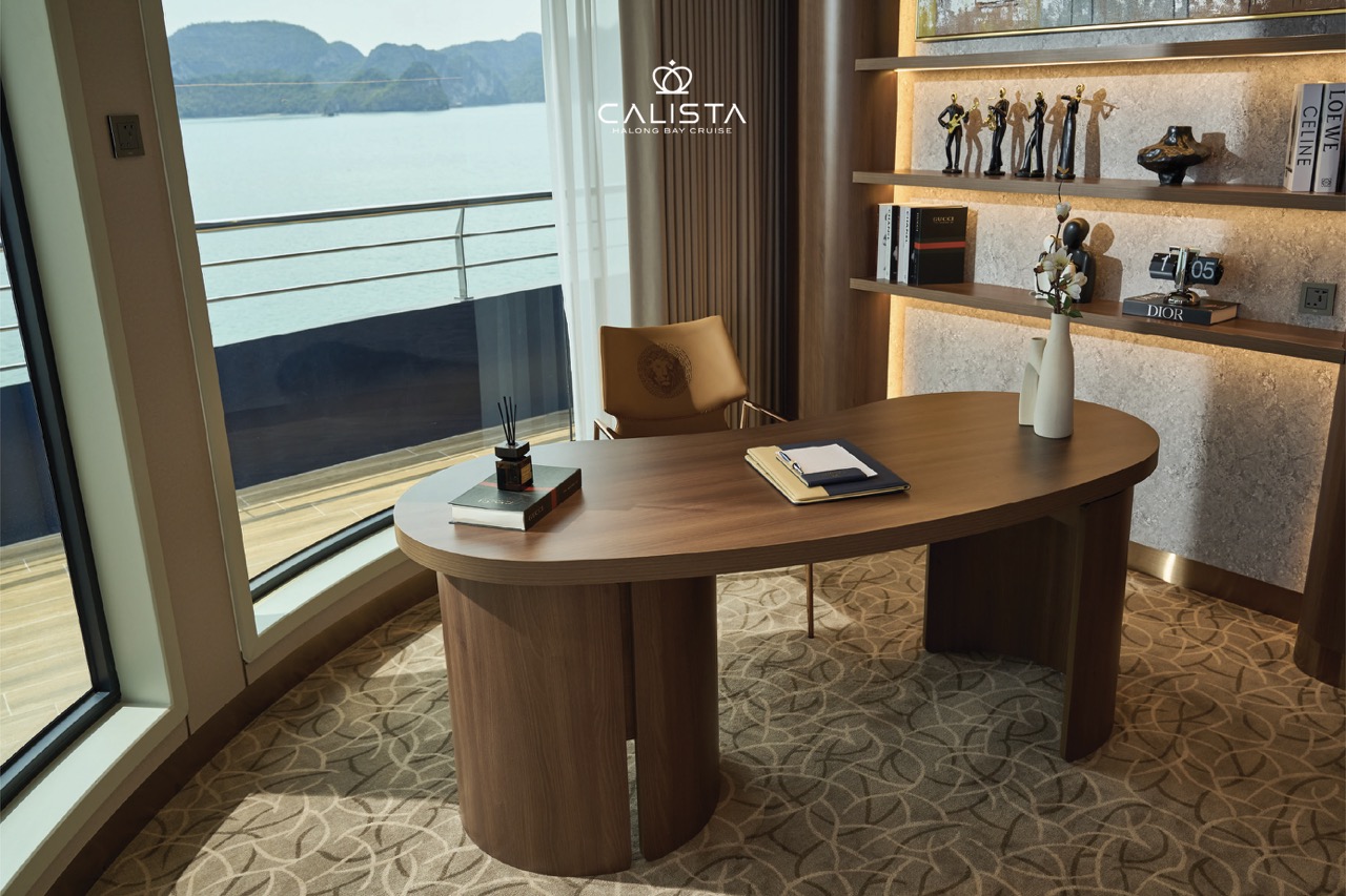 Luxurious Halong Bay cruise balcony with scenic water views and elegant interior design.