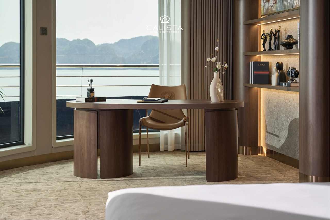 Elegant cruise balcony view of Halong Bay with scenic mountains and calm waters, perfect for a relax.