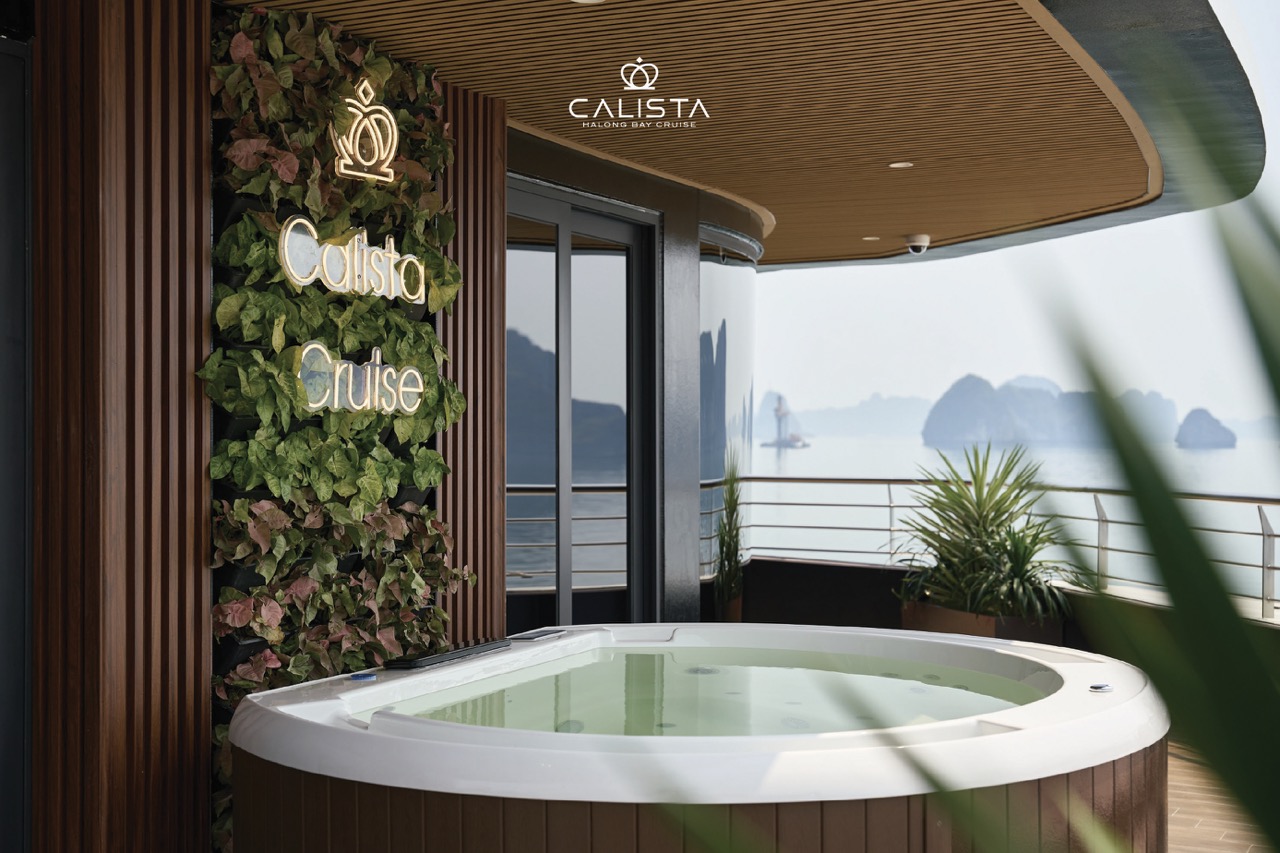 Relaxing hot tub with scenic Halong Bay views on Calista Cruise.