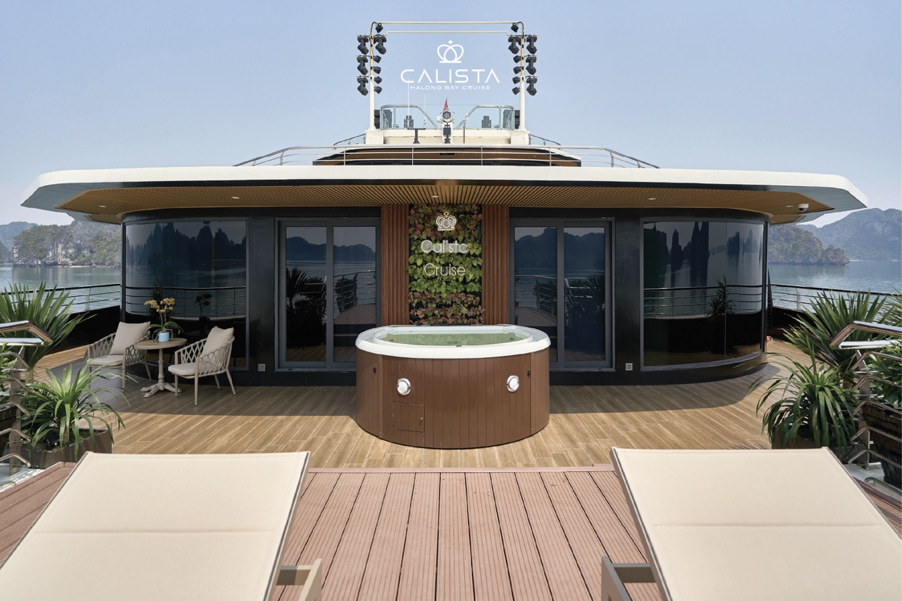 Luxurious Calista Cruise yacht with panoramic views and relaxing hot tub in Halong Bay, perfect for.