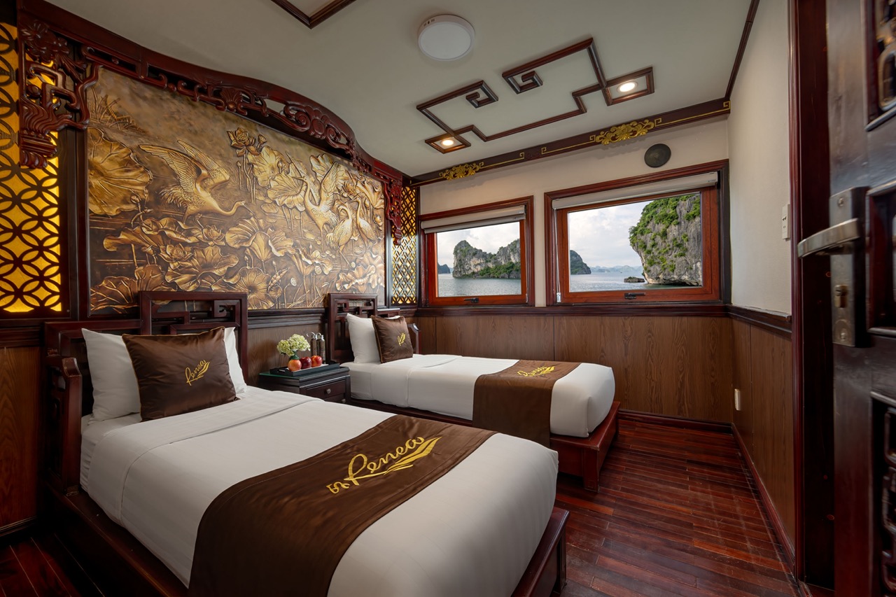 Stunning cruise balcony view in Halong Bay showcasing tranquil waters and lush karst formations.