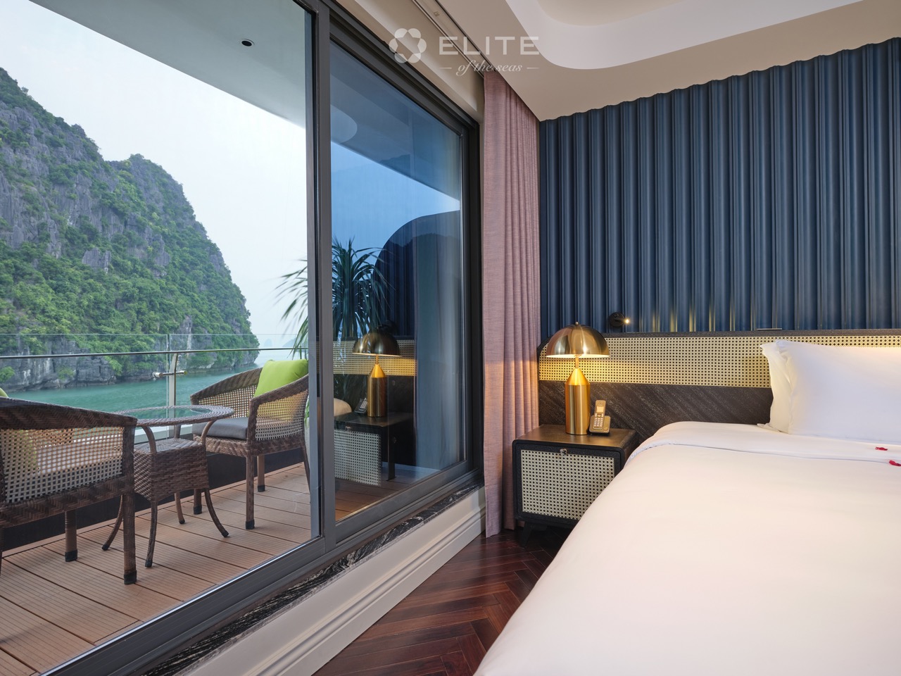 Stunning Halong Bay view from luxury cruise balcony, perfect for relaxing and exploring the iconic l.