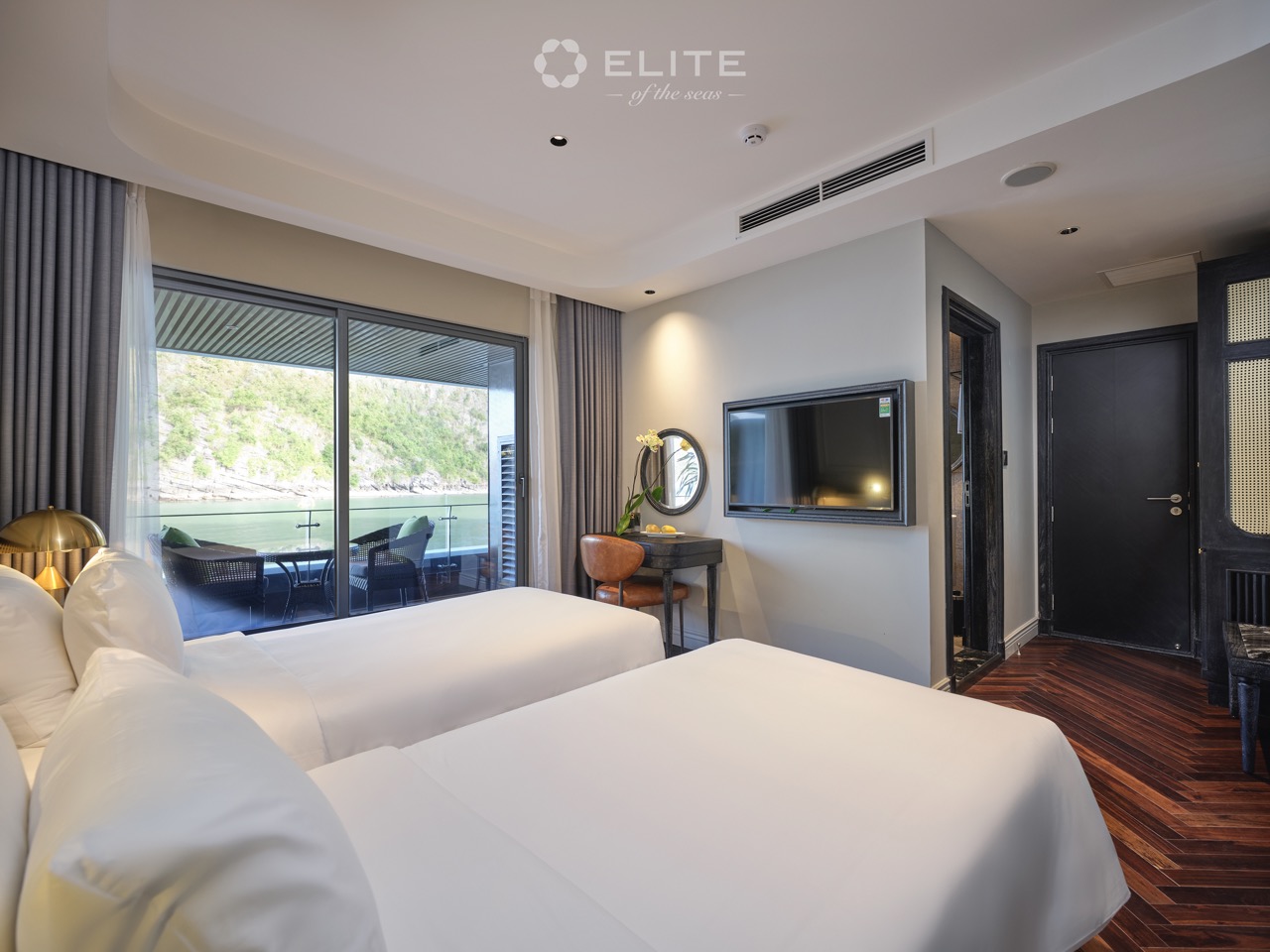 Beautiful cruise balcony view of Halong Bay with serene waters and lush green islands, perfect for a.