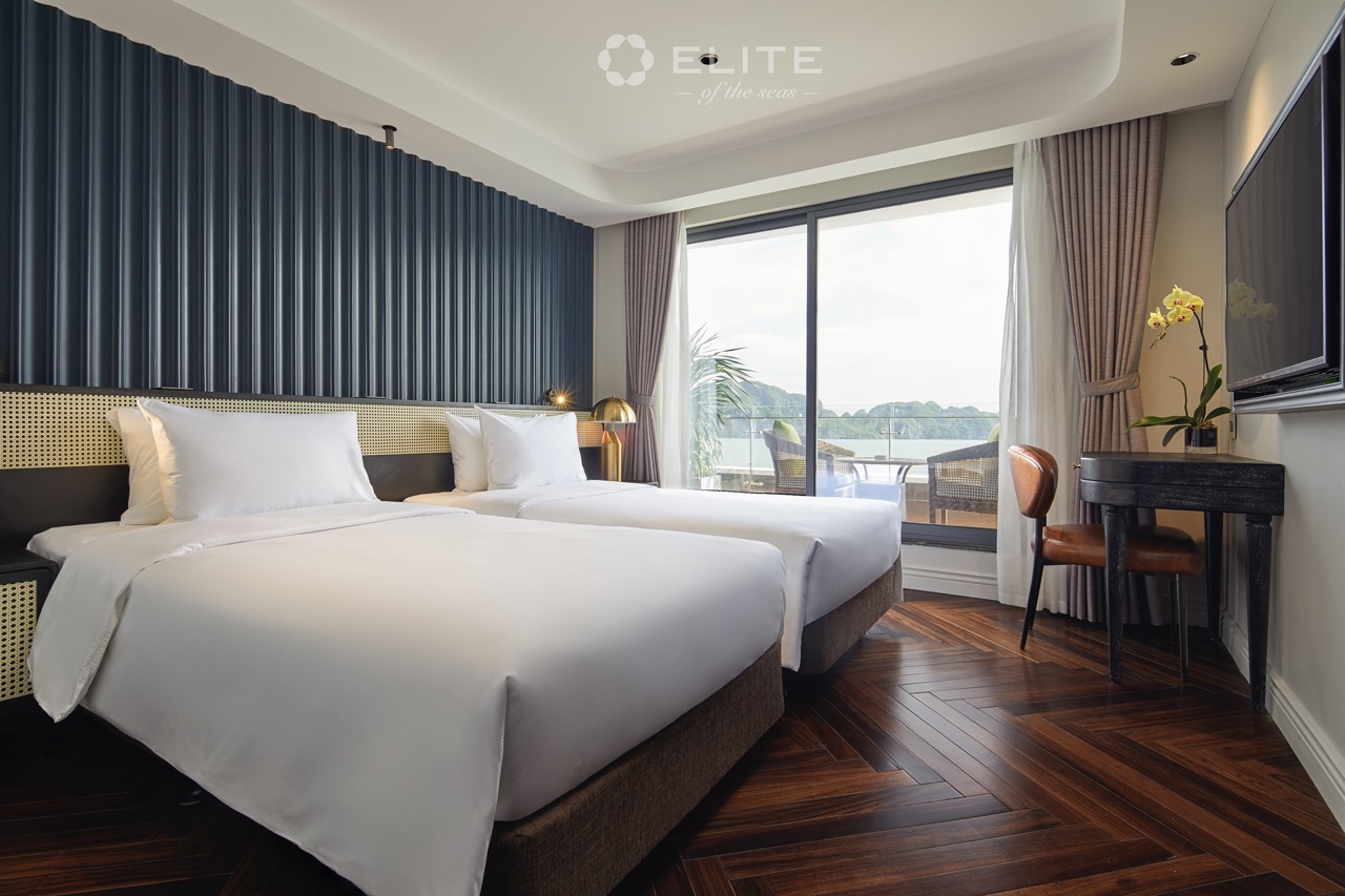 Luxurious cruise balcony room overlooking Halong Bay, perfect for a relaxing and scenic getaway with.