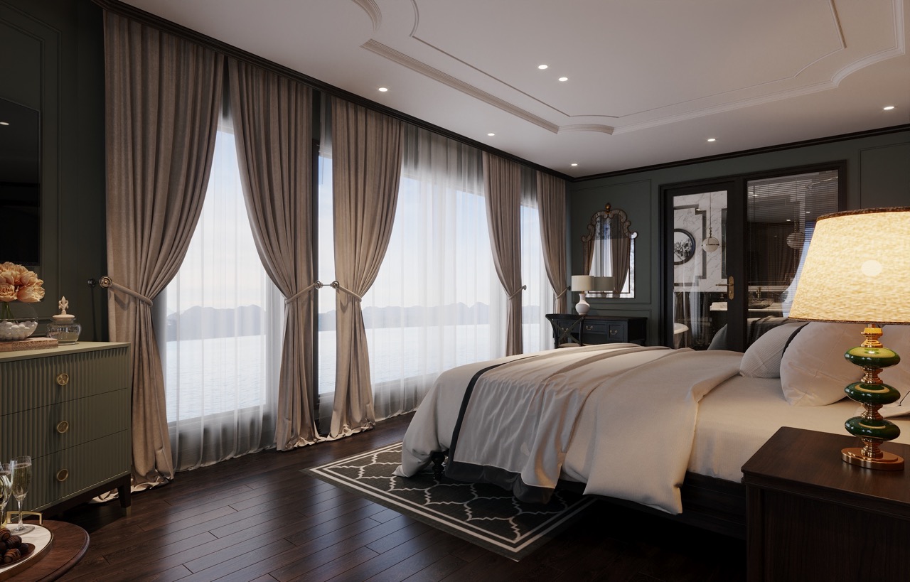 Luxurious ocean-view bedroom with elegant décor and soft lighting, ideal for relaxing stays.