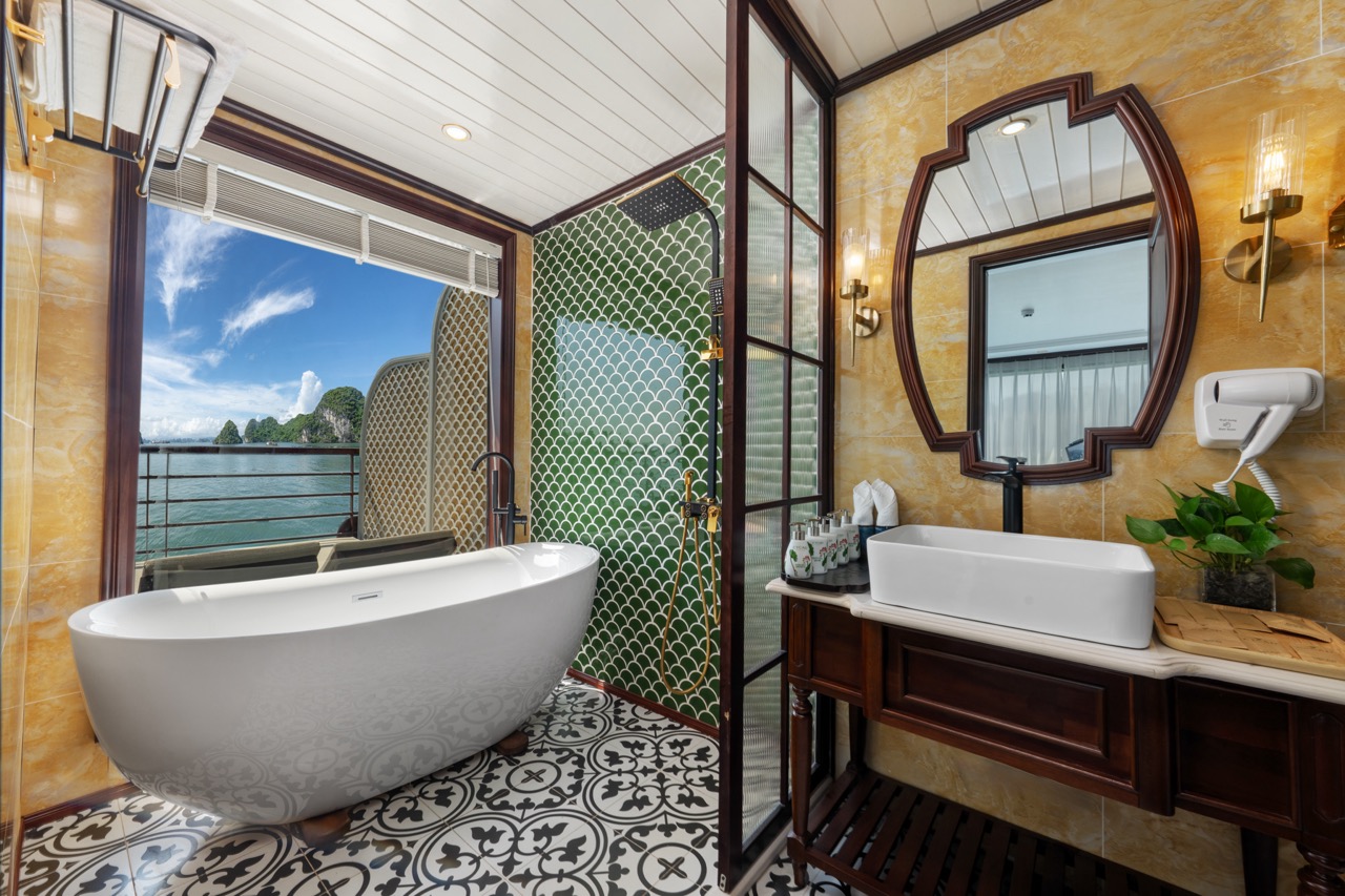 Luxurious Bai Tu Long cruise bathroom with elegant decor and scenic views, perfect for a relaxing ge.