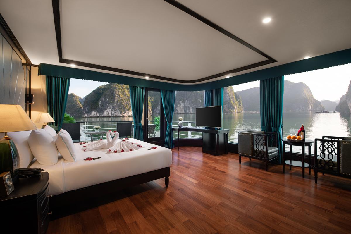 Stunning river view suite at ViettrendTour hotel with luxurious amenities and elegant decor.