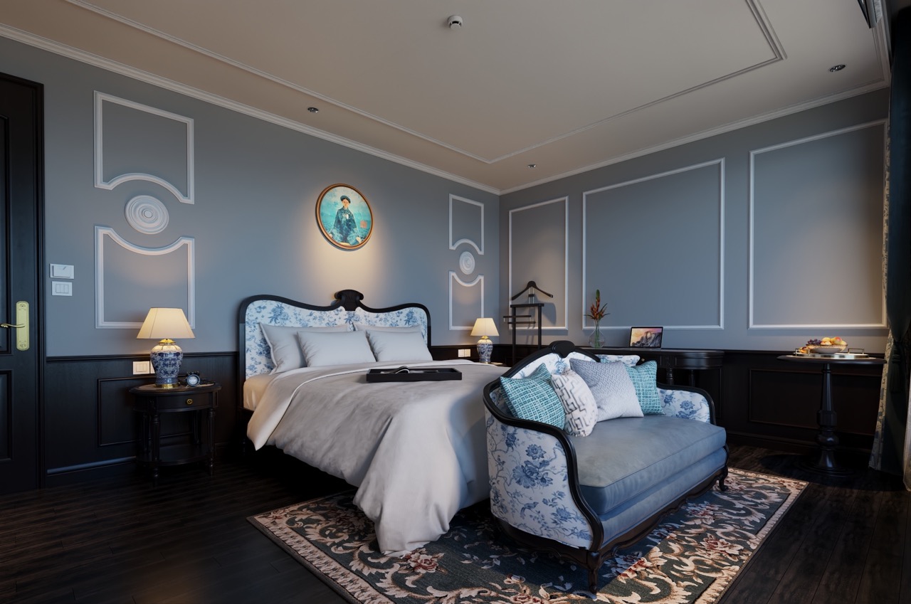 Elegant cruise room with plush bedding and stylish decor, perfect for a relaxing Lan Ha Bay getaway.