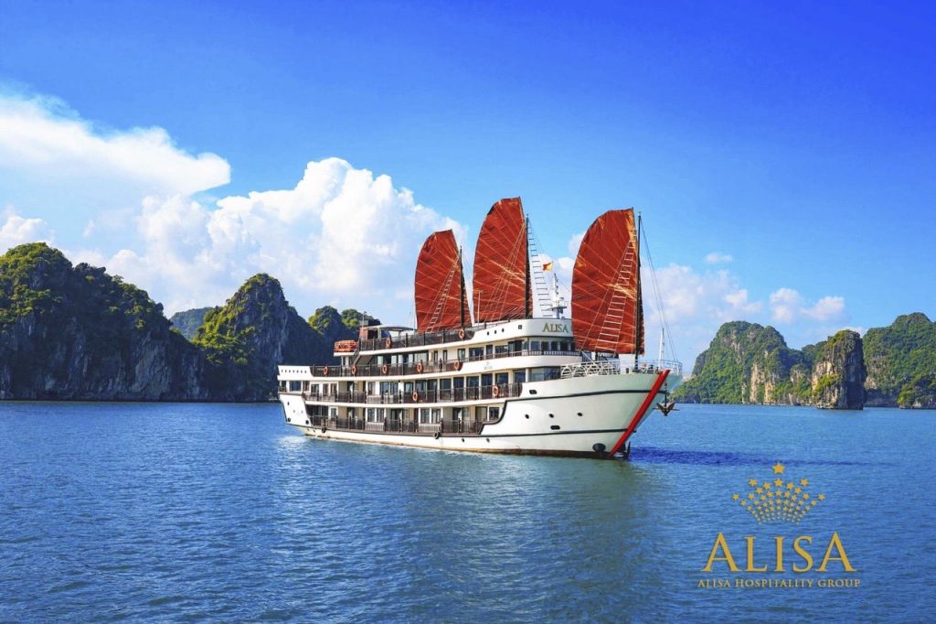 Beautiful Halong Bay cruise with traditional sails, scenic limestone islands, and tranquil waters.