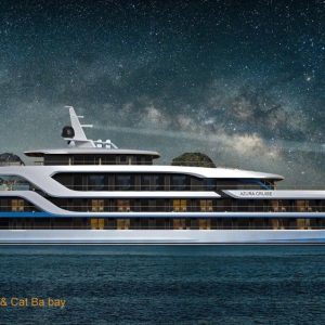 Luxurious yacht on Ha Long Bay under starry night sky, Azura cruises.