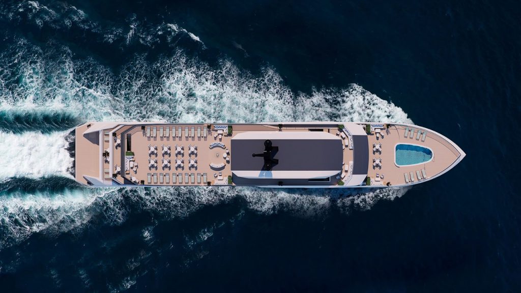 Luxury cruise yacht with outdoor sunbathing deck and swimming pool in the open sea.