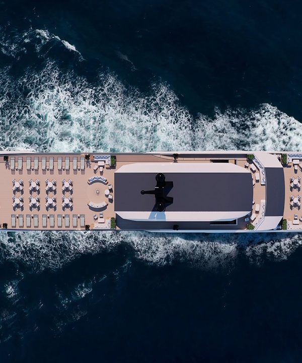 Luxury cruise yacht with outdoor sunbathing deck and swimming pool in the open sea.