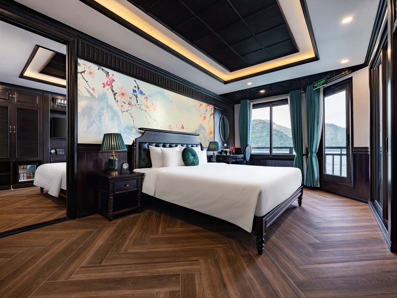 Stunning view from a luxury cruise balcony in Halong Bay, perfect for relaxing and enjoying scenic s.