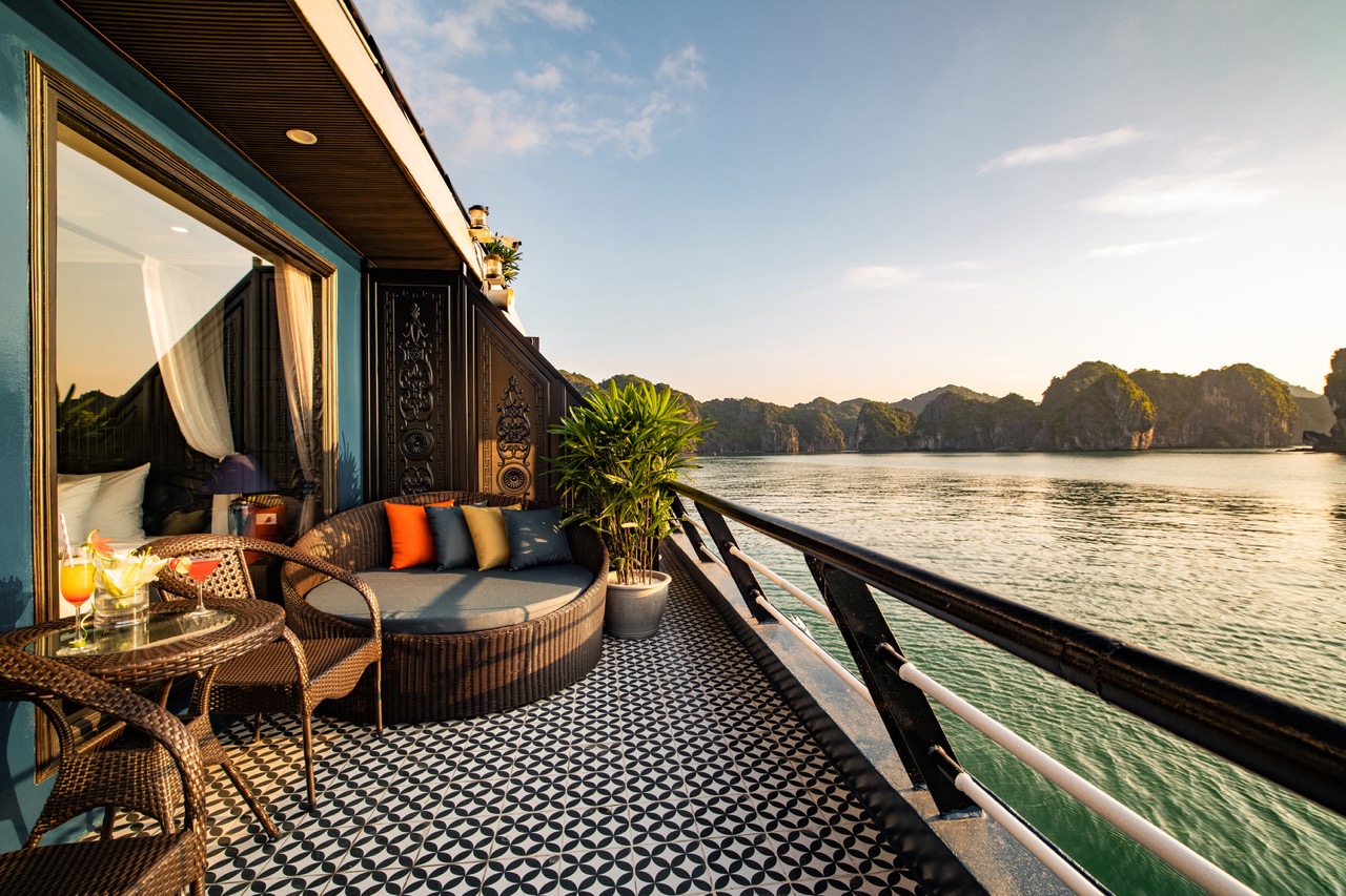 Stunning view from a luxury cruise balcony in Halong Bay, perfect for relaxing and enjoying the scen.