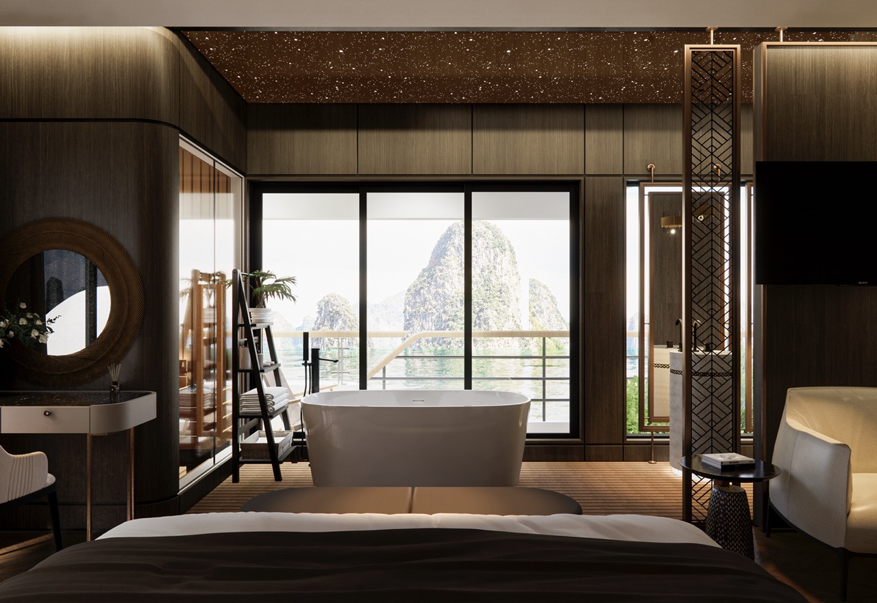 Luxurious hotel room with mountain view, bathtub, modern decor, and balcony in Vietnam.