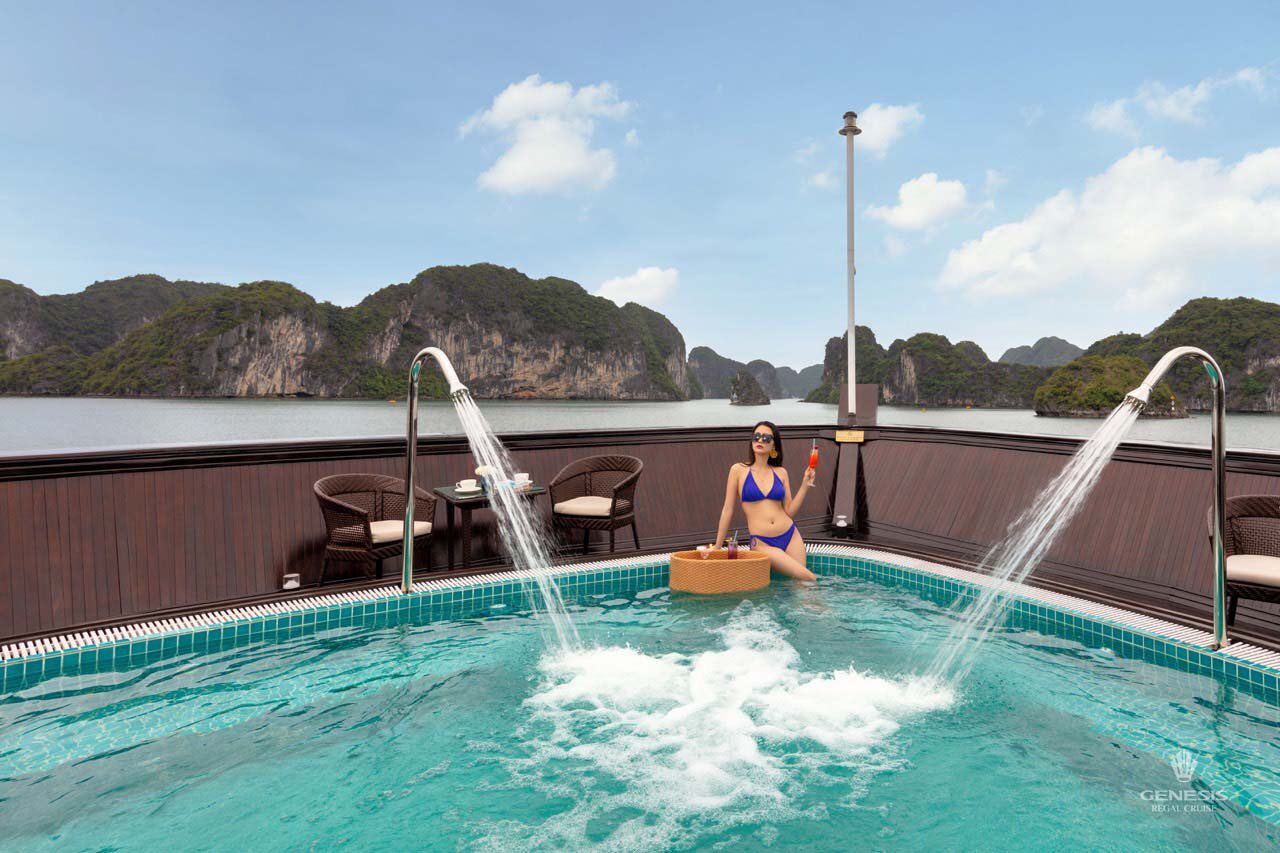 Enjoy stunning Halong Bay scenery from the cruise balcony with relaxing atmosphere.