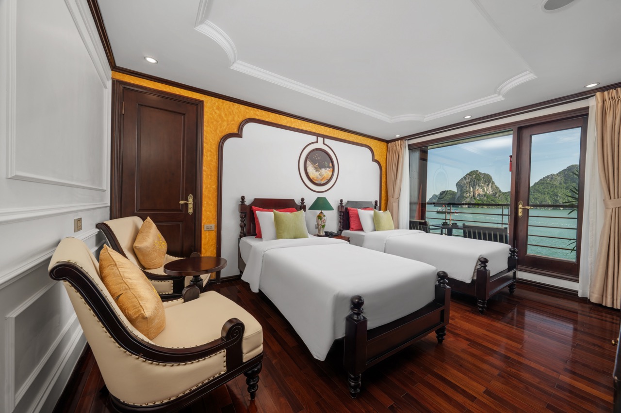Elegant cruise balcony view of Bai Tu Long Bay with serene waters and lush islands, perfect for a re.