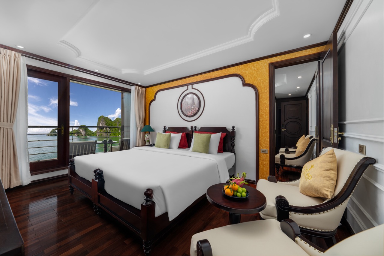 Elegant cruise balcony with scenic views of Bai Tu Long Bay, perfect for a relaxing getaway.