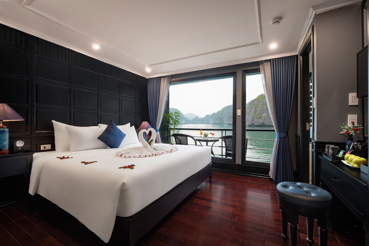 A romantic cruise balcony view of Halong Bay with lush islands and calm waters, perfect for a memora.