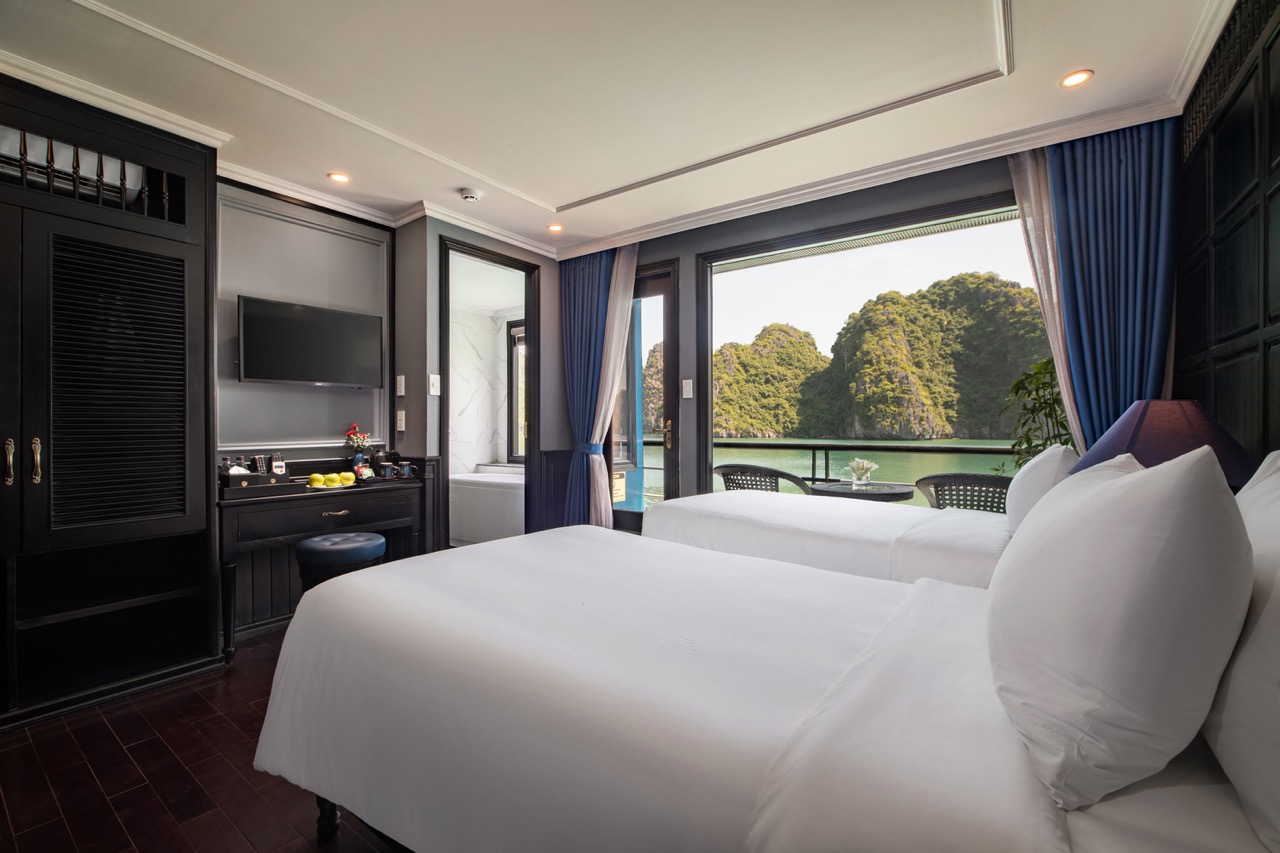 Scenic view of Halong Bay from a luxury cruise balcony, perfect for a relaxing and memorable travel.