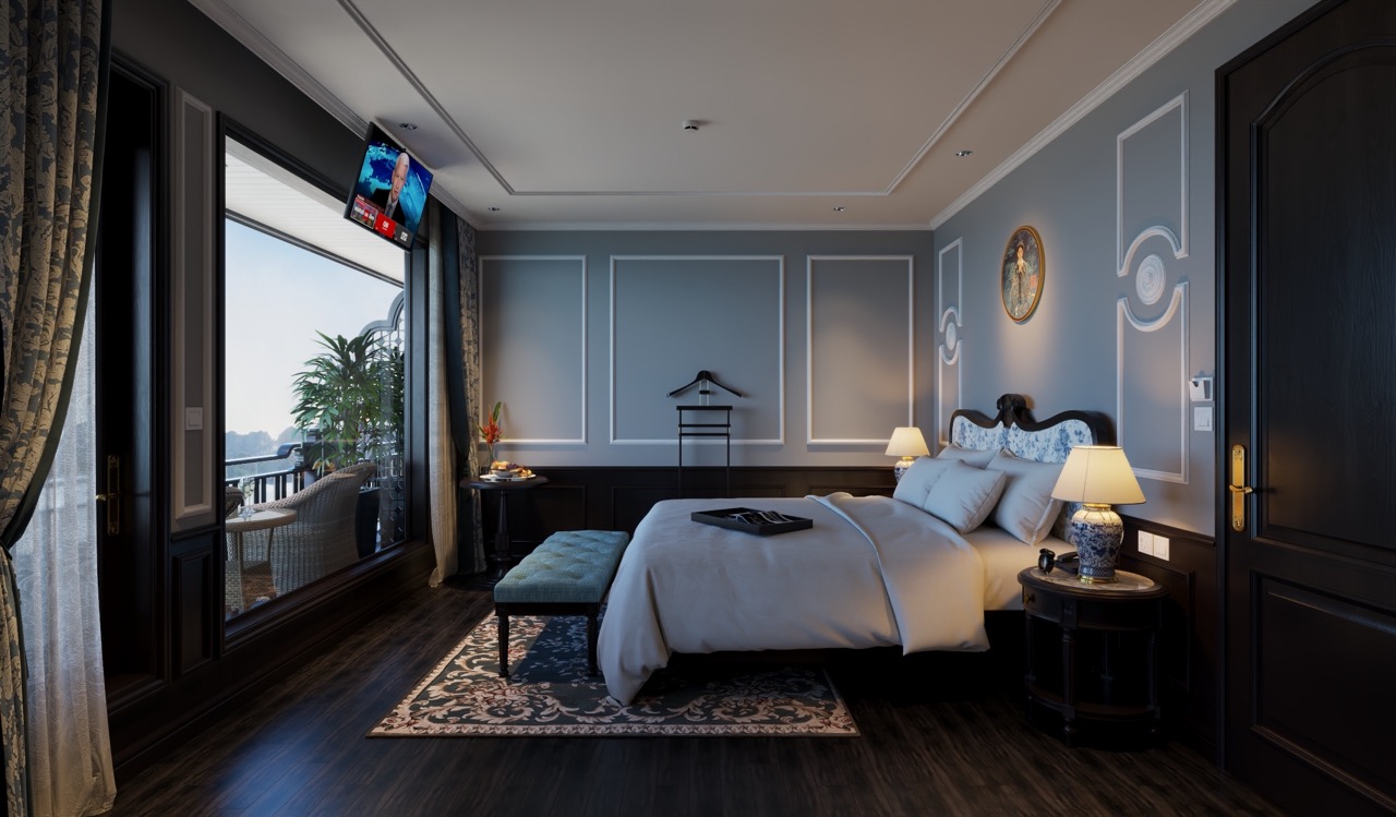 Elegant cruise cabin with balcony view of Lan Ha Bay, perfect for a relaxing getaway.