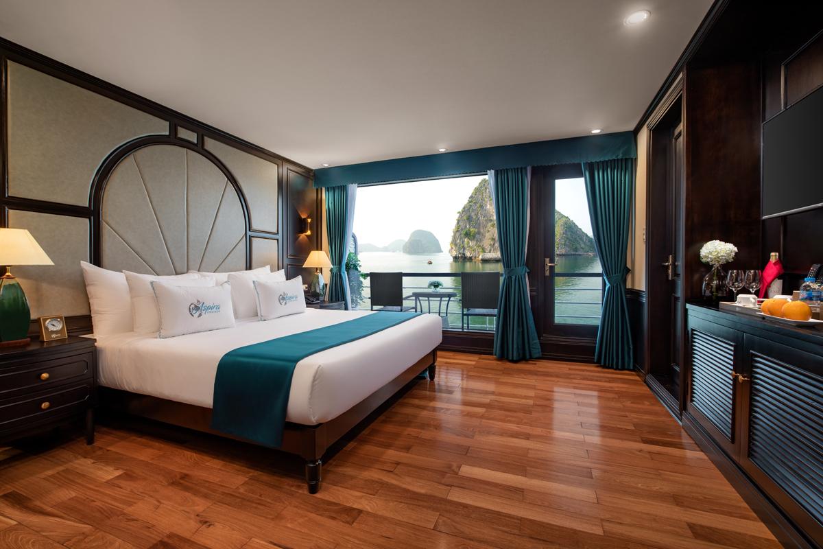 Luxury hotel room with stunning bay view and elegant decor in Vietnam.