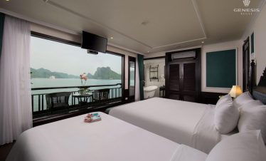 Stunning view of Halong Bay from a cruise balcony, showcasing serene waters and limestone karsts, pe.