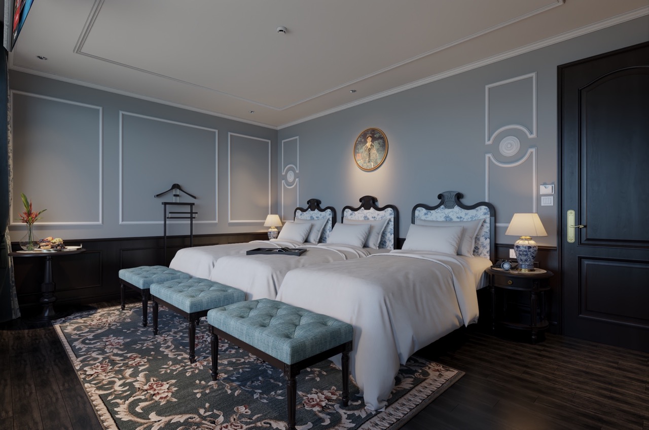 Elegant cruise balcony view of Lan Ha Bay with comfortable beds and stylish decor.