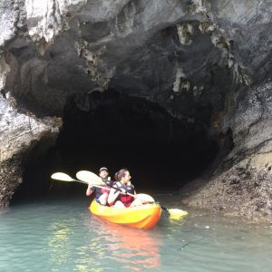 kayaking-cave-exploration-limestone-arch-bai-tu-long-cruise-bai-tu-long-bay-viettrendtour