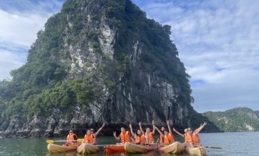 Enjoy kayaking and scenic views on a Halong Bay cruise with friends and family.