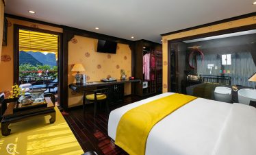 Stunning view of Halong Bay from a luxury cruise balcony, perfect for relaxing and sightseeing.
