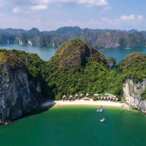 Spectacular view of Halong Bay with lush islands and clear waters, perfect for Vietnam travel adventures.