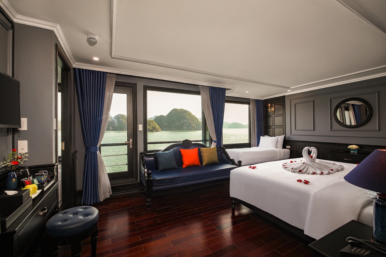Stunning view from a luxury cruise balcony in Halong Bay, perfect for relaxing and sightseeing.