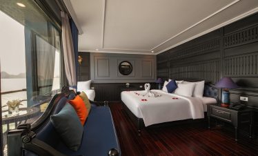 Stunning view from a Halong Bay cruise balcony showcasing serene waters and lush islands, perfect fo.