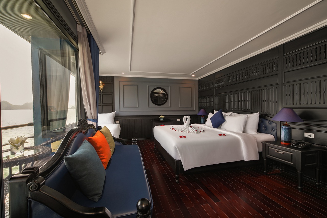 Stunning view from a Halong Bay cruise balcony showcasing serene waters and lush islands, perfect fo.