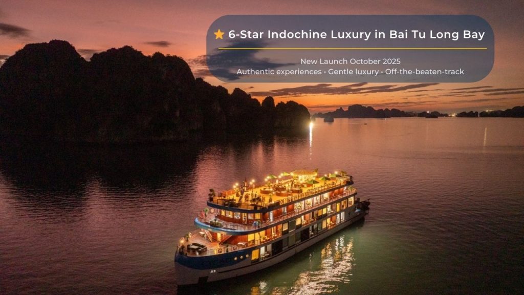 Luxurious cruise sailing through Bai Tu Long Bay at sunset, showcasing stunning natural beauty and s.