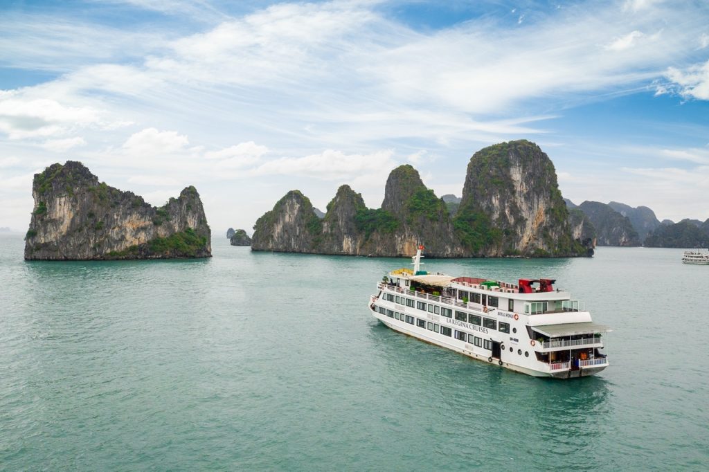 Stunning Halong Bay cruise with limestone islands and emerald waters.