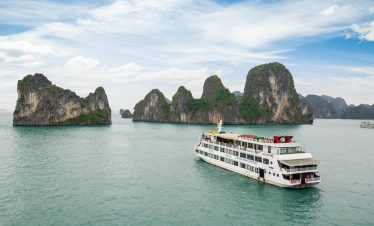 Stunning Halong Bay cruise with limestone islands and emerald waters.