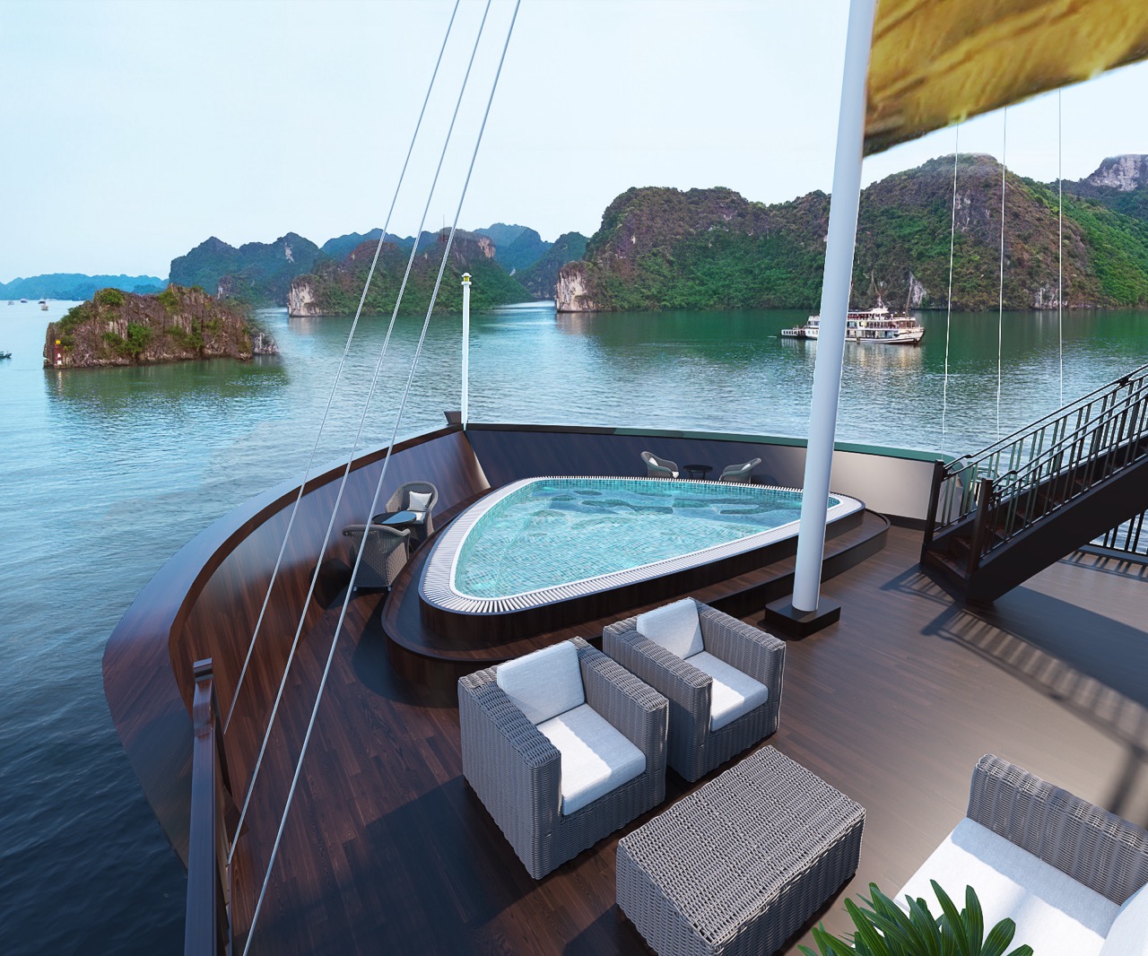 Relaxing cruise balcony with stunning Lan Ha Bay scenery and emerald waters.