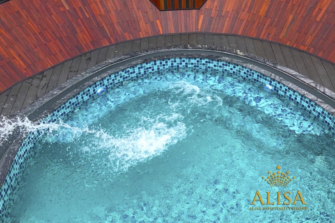 Relaxing spa pool with bubbling water at a luxury resort in Vietnam.