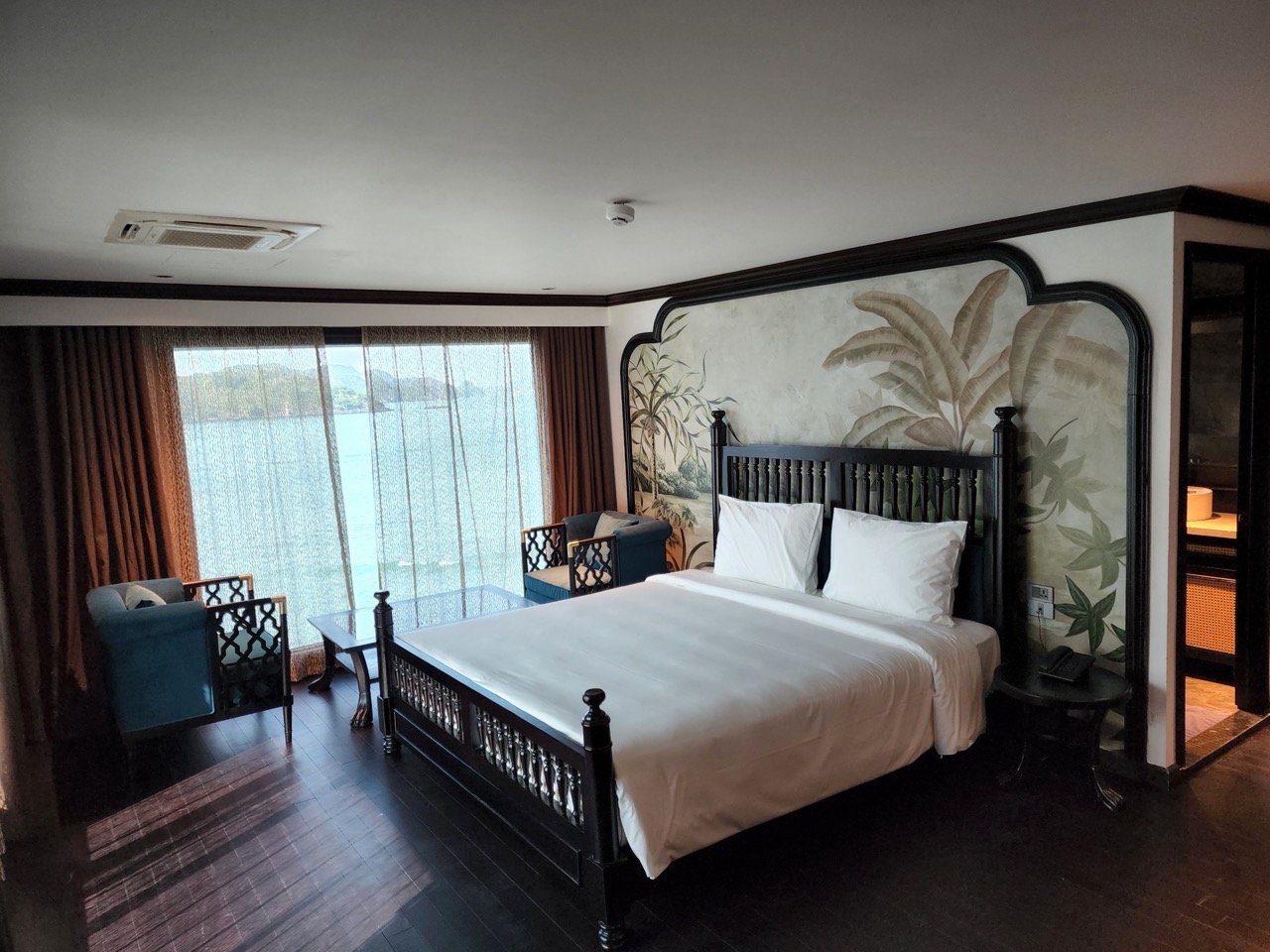 Halong Bay cruise balcony with scenic views and luxurious comfort.