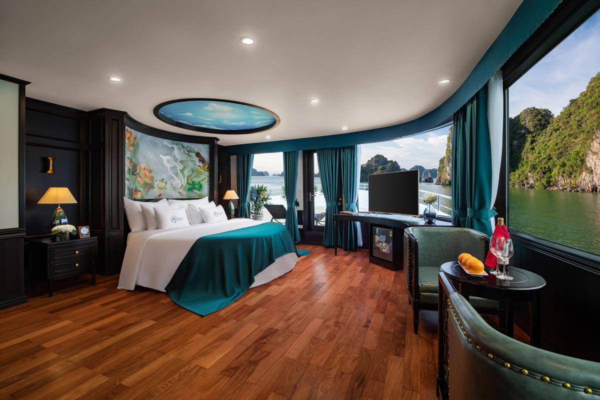 Luxury sea view hotel room with balcony and scenic limestone island views in Vietnam.