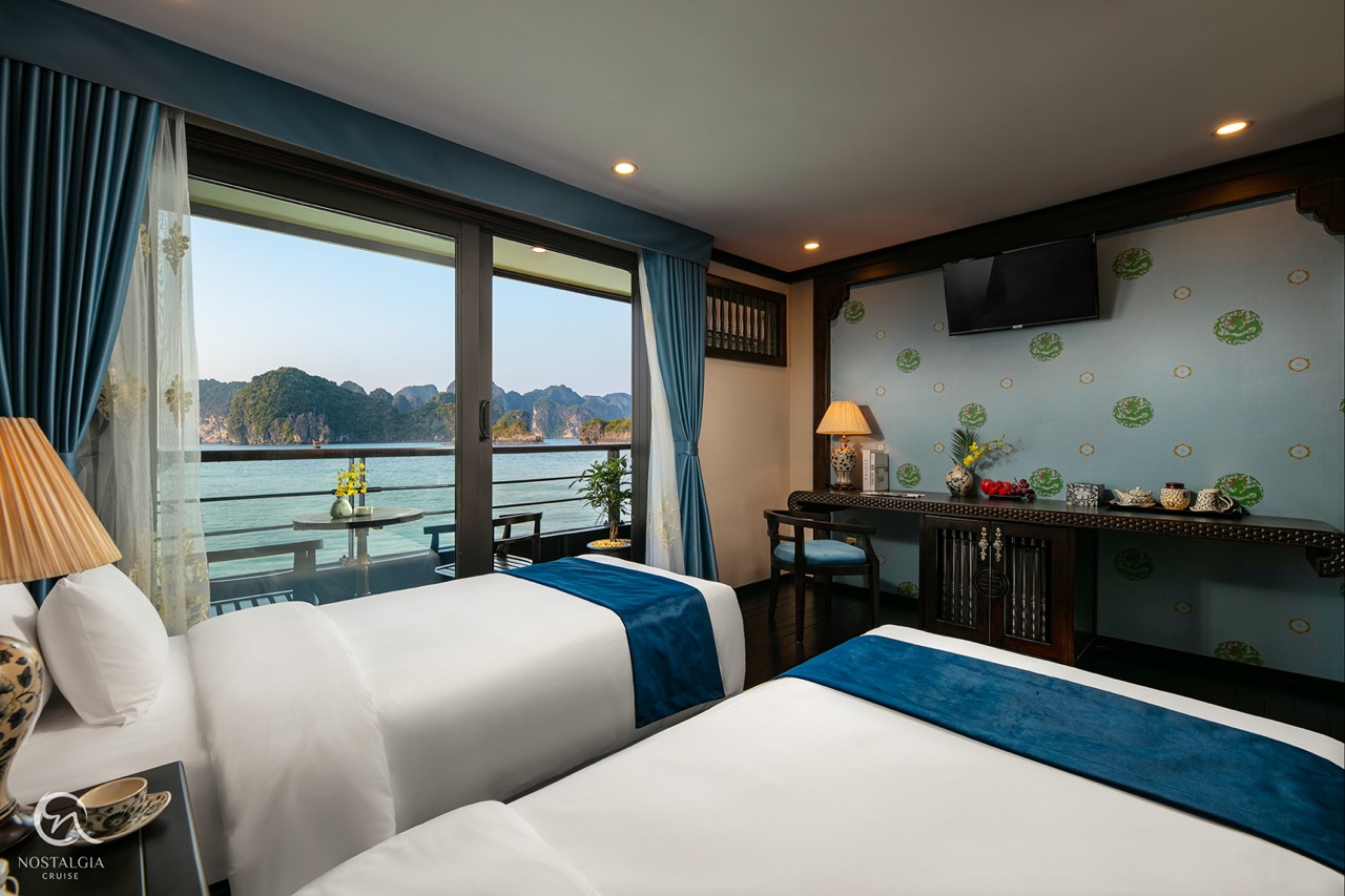 Beautiful cruise balcony view of Halong Bay with serene waters and limestone islands, perfect for a.